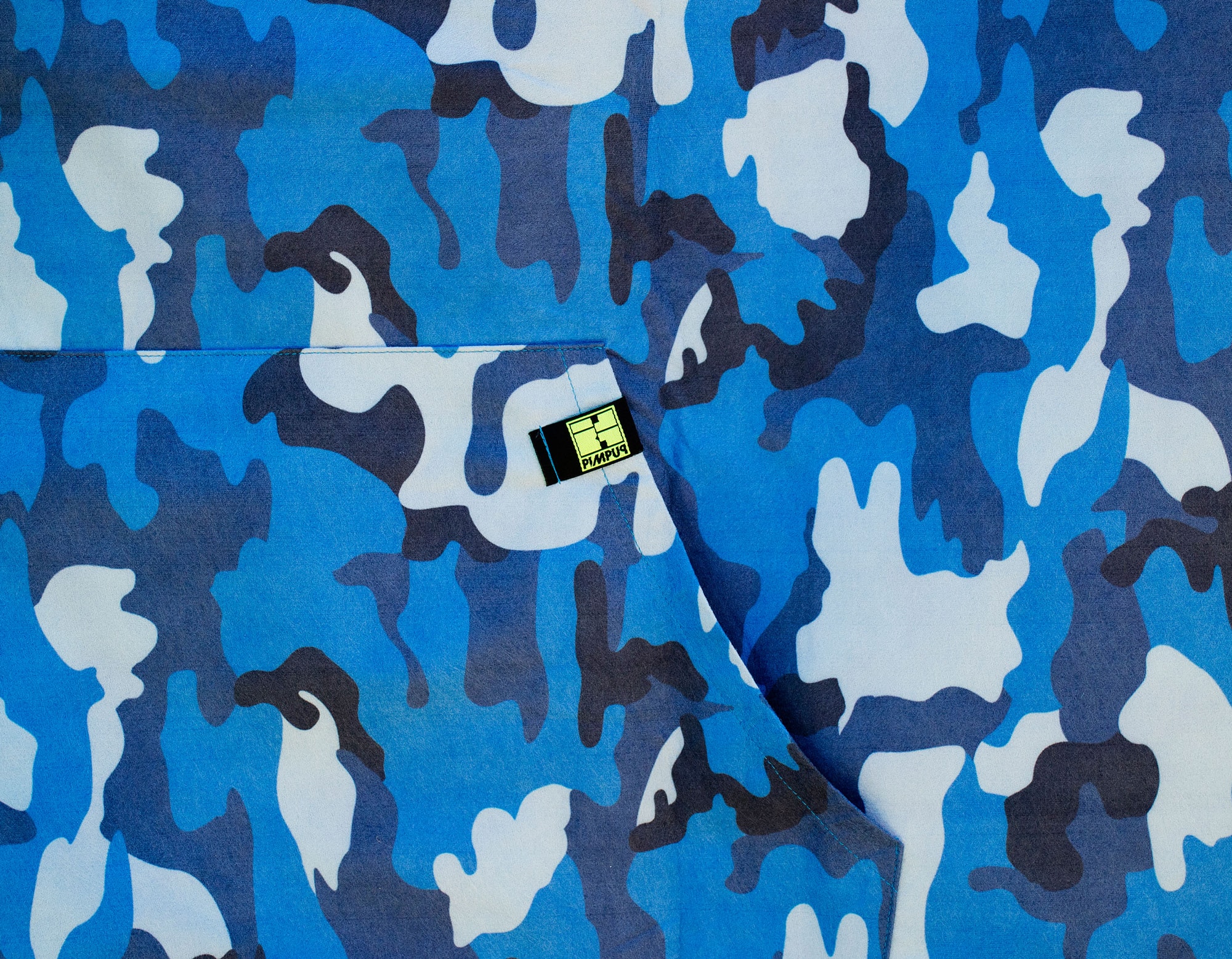 Poncho with pocket for your stuff by PIMPUP